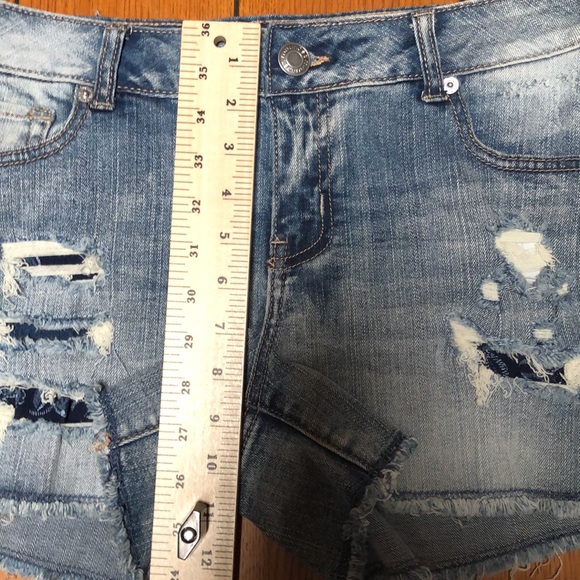 Maurices distressed, patched distressed denim cut off Jean shorts size 3/4 - Picture 9 of 10